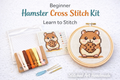 Cute hamster counted cross stitch kit with finished design in embroidery hoop, Aida fabric, floss, and beginner pattern.
